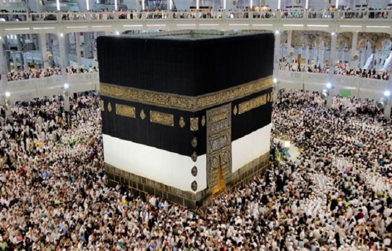 People perform Hajj rituals around the Kaaba at the Grand Mosque in the holy city of Mecca, Saudi Arabia.
