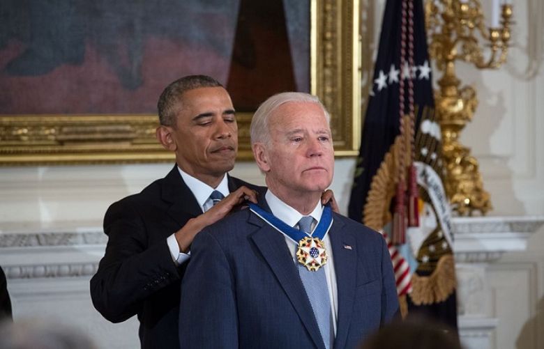 President Obama awarding the Presidential Medal of Freedom with Distinction to Vice President Biden
