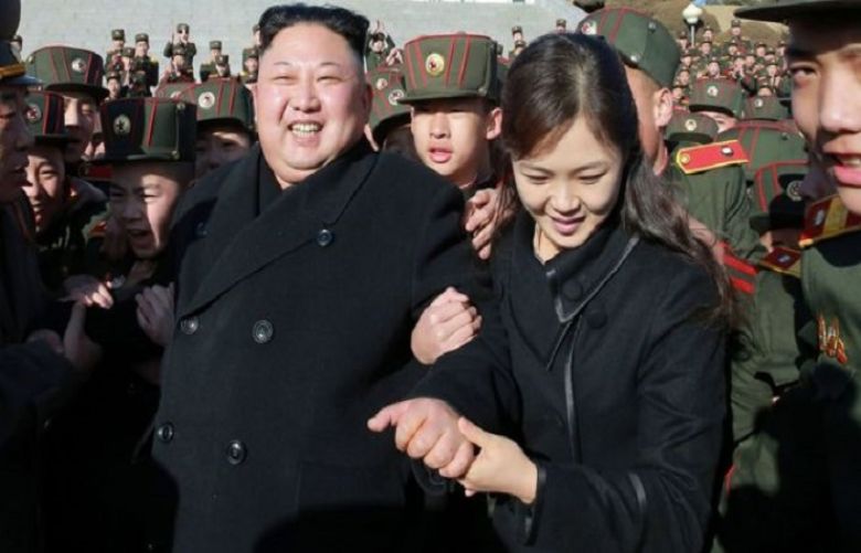Kim Jong-un is said to have become a father for the third time with his wife (pictured together in March 2017)