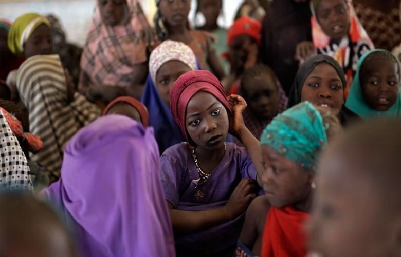Nigerian girls who fled Boko Haram to Chad gather in a school set up by UNICEF at the Baga Solo refugee camp in Chad.
