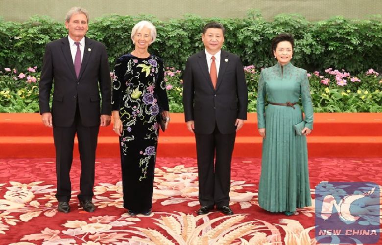Chinese President Xi Jinping and his wife Peng Liyuan welcome Christine Lagarde, managing director of the International Monetary Fund (IMF), and her husband before a banquet for the Belt and Road Forum (BRF) for International Cooperation in Beijing, capital of China, May 14, 2017