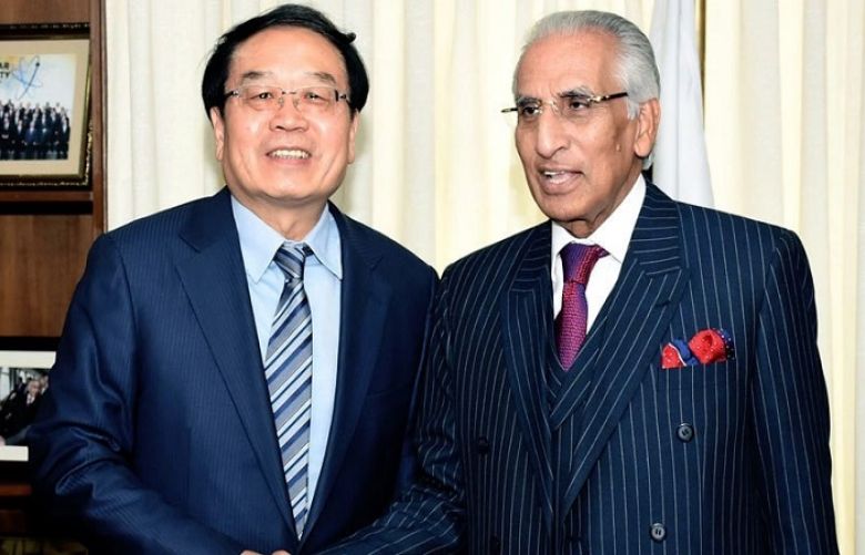 Special assistant to the PM on Foreign Affairs Syed Tariq Fatemi shaking hand with the Chiese State Commissioner for Counter Terrorism and Security Cheng Cuoping