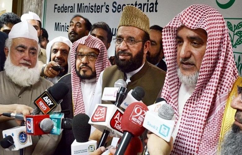 Minister for Religious Affairs addressing a press conference.
