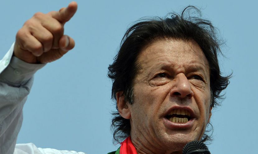 Imran Khan addresses supporters during an anti-government protest in front of the Parliament in Islamabad on August 27, 2014.