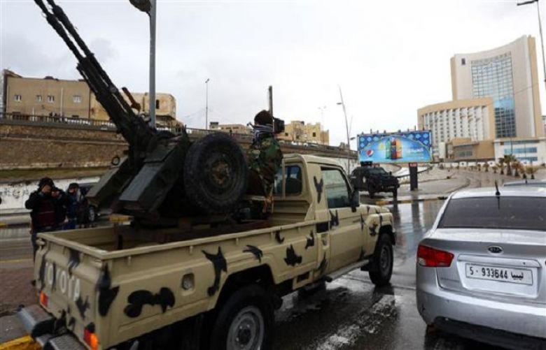 Libyan security forces surround Corinthia Hotel (R) in the capital, Tripoli, on Jan. 27, 2015.