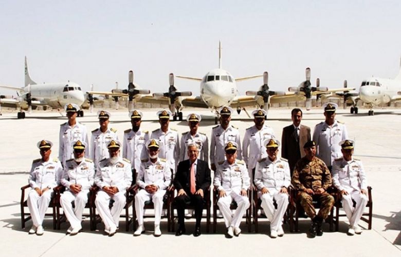 Minister for Defence Khawaja Asif and Chief of the Naval Staff, Admiral Zakaullah pose in a group photo at the station.
