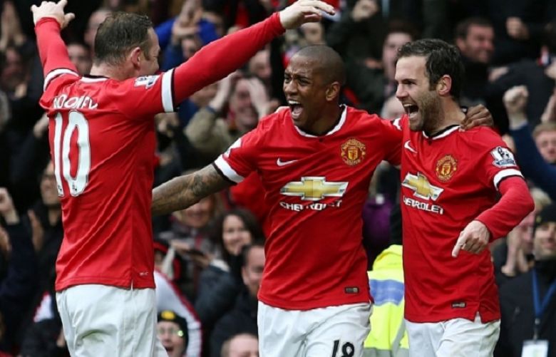 On the up: Manchester United could yet win the Premier League title