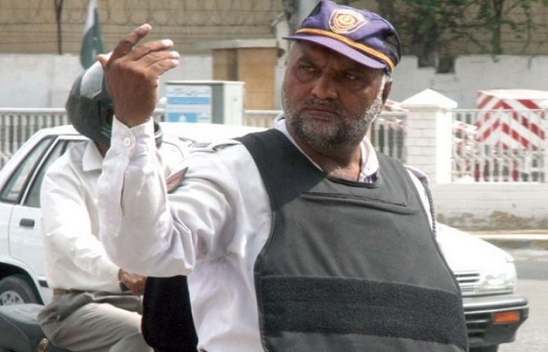 Self-defense: In this picture a traffic police official wears a bulletproof jacket to protect himself