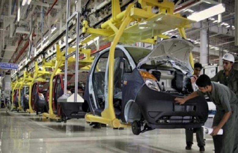 File photo shows employees of Tata Motors working on the assembly line of a Nano car during the inauguration of the Nano plant in Sanand, about 40 kilometers (25 miles) from Ahmadabad, India.