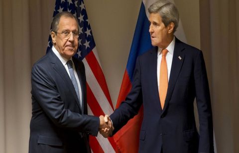 U.S. Secretary of State John Kerry shakes hands with Russian Foreign Minister Sergey Lavrov before their meeting on Syria, in Zurich, Switzerland, January 20, 2016.