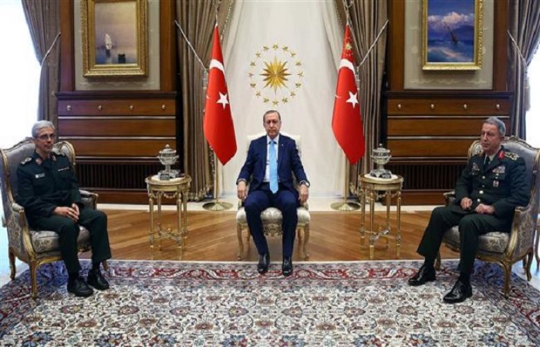 A handout picture released by the Turkish president&#039;s press office on August 16, 2017 shows Turkish President Recep Tayyip Erdogan (C) and Chief of the General Staff of the Turkish Armed Forces Hulusi Akar (R) meeting with Chief of Staff of the Iranian Armed Forces Major General Mohammad Baqeri at the presidential complex in Ankara.