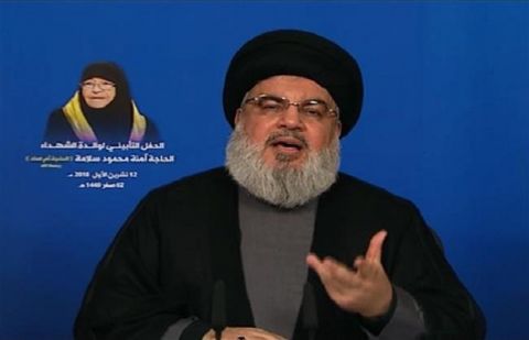 An image grab taken from Lebanon-based Arabic-language al-Manar television network on October 12, 2018, shows the Secretary General of Lebanon's Hezbollah resistance movement Sayyed Hassan Nasrallah giving a televised speech broadcast from the Lebanese capital city of Beirut.