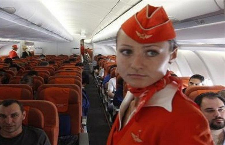 People sit onboard an Aeroflot Airbus A330 plane heading to the Cuban capital Havana at Moscow&#039;s Sheremetyevo airport. 