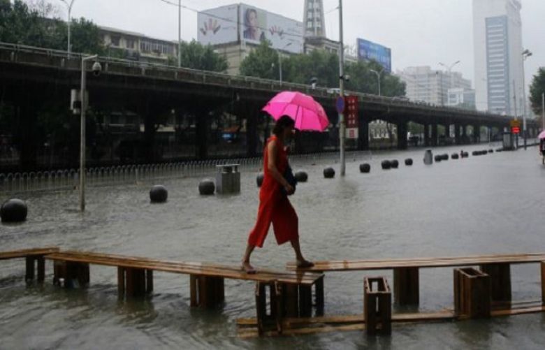 Floods in China kill scores