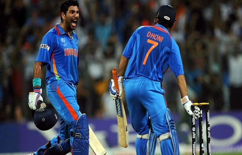 Mahendra Singh Dhoni and Yuvraj Singh exult after winning the World Cup, 2011.