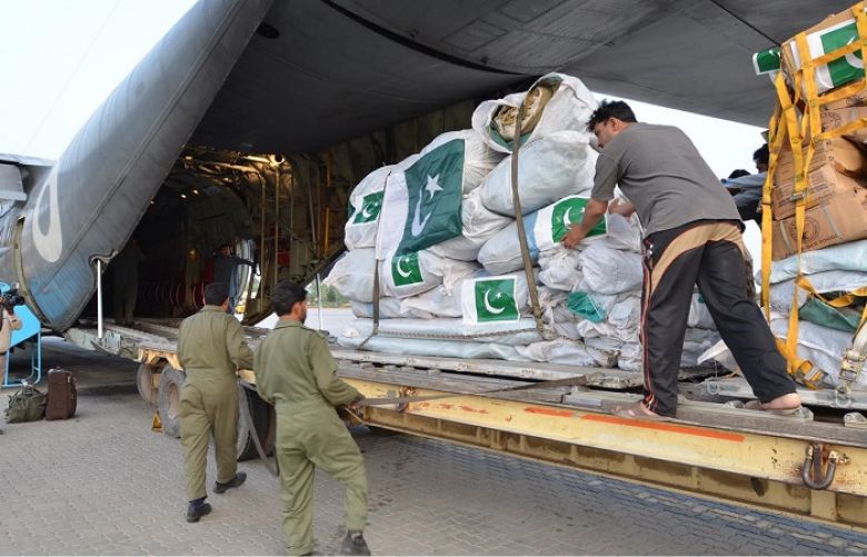 One of the 2 PAF C-130 aircraft being loaded at PAF Base Nur KHan with relief goods for people of earthquake hit areas of Nepal.