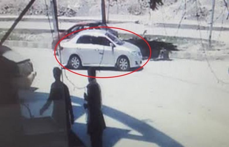 CCTV footage shows the car in which the Chinese nationals were abducted.