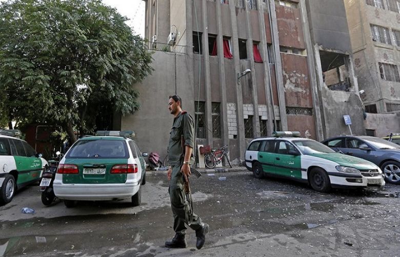 Three suicide bombers blew themselves up near the main police headquarters building in Syria’s capital Damascus.