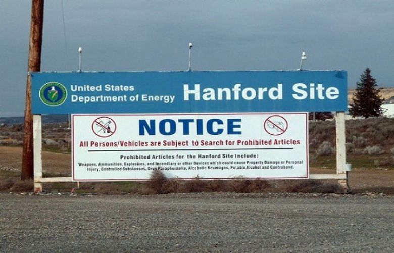 This file photo taken on March 17, 2011 shows a sign warning visitors of searches for prohibited materials as they near the Hanford nuclear site in Hanford, Washington. 