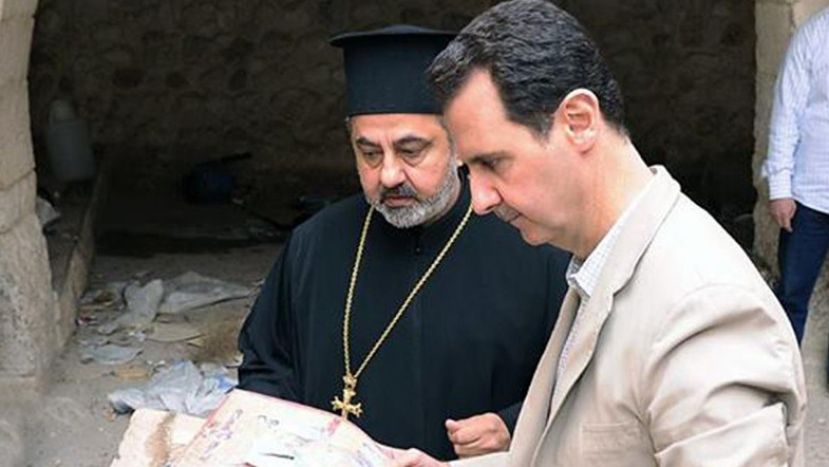 On Easter Sunday, Assad visits recaptured Christian town