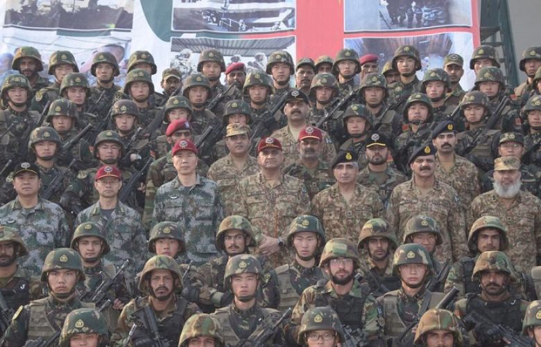 COAS photographed with participating troops of both countries in Pak-China joint exercise warrior 4
