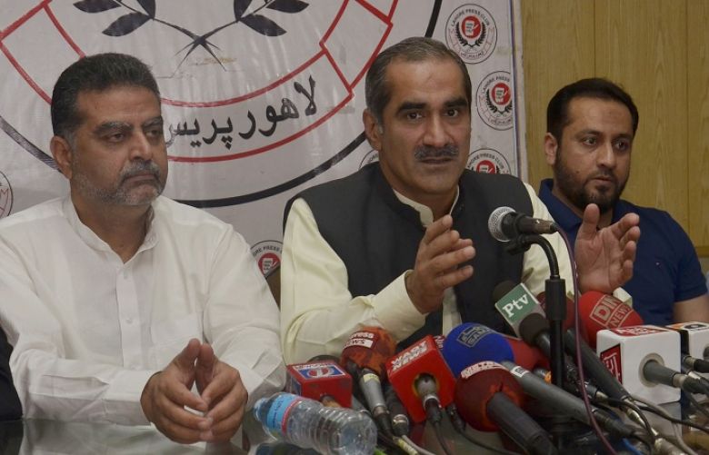 Federal Minister for Railways Khawaja Saad Rafique addressing a press conference at press club.