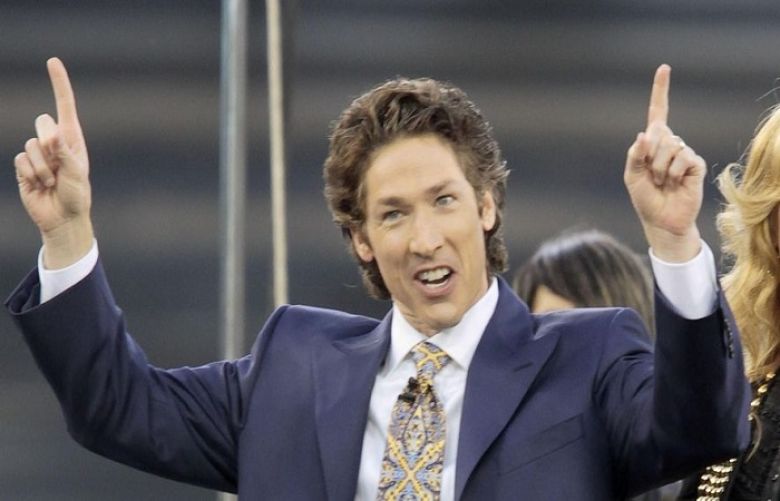 This April 24, 2010, file photo shows Lakewood Church pastor Joel Osteen at Dodger Stadium during his &quot;A Night of Hope&quot; in Los Angeles. Osteen said in a statement to ABC News on Aug. 28, 2017, that his Lakewood Church would open as a shelter for Hurricane Harvey victims if needed.