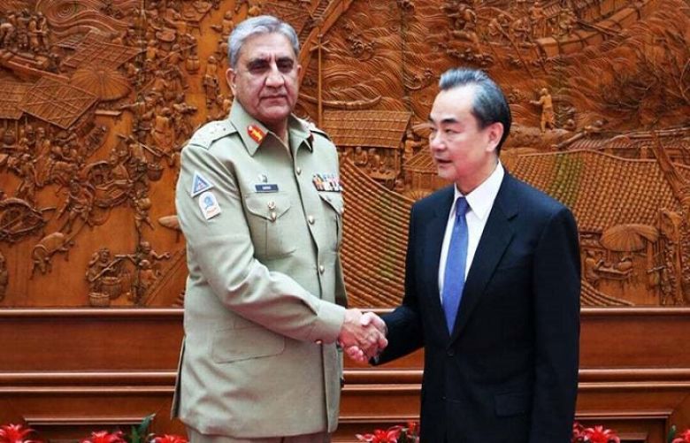 Chief of Army Staff Gen Qamar Javed Bajwa met Chinese Foreign Minister Wang Yi at the Chinese Foreign Office in Beijing