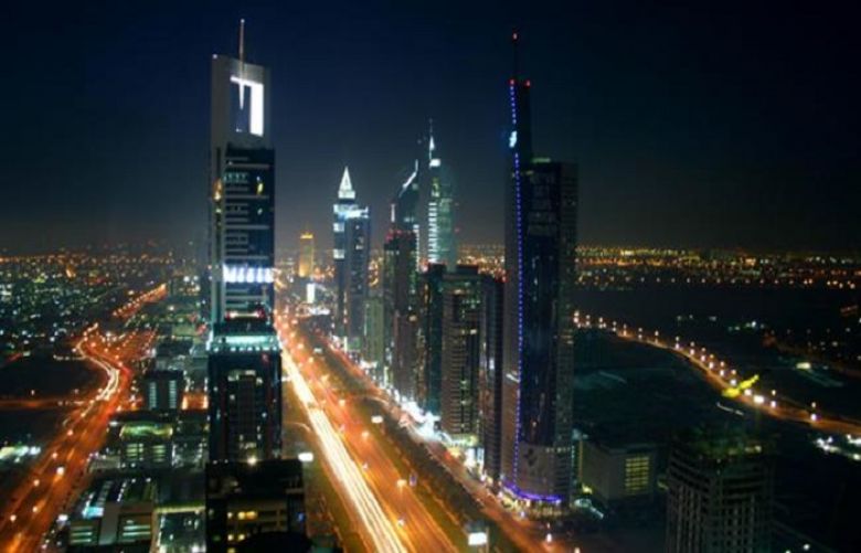 This file photo shows a view of the skyline in Dubai, the United Arab Emirates, at night.