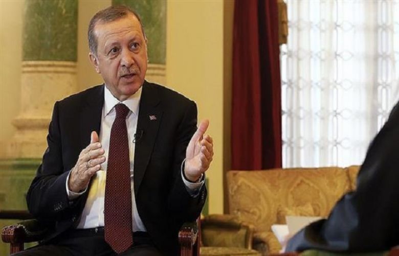 Turkish President Recep Tayyip Erdogan speaks during an interview with Portuguese broadcaster RTP on July 15, 2017.