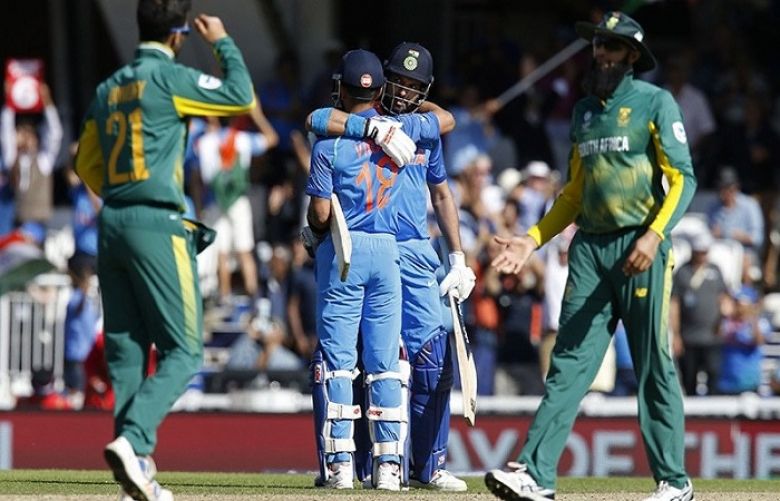 Yuvraj Singh (2nd R) and Indian captain Virat Kohli (2nd L) celebrate after winning the ICC Champions Trophy match against South Africa at The Oval in London.