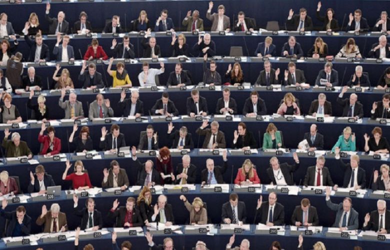 Members of the EU Parliament take part in a voting session, on December 17, 2014 during a session of the European Parliament in Strasbourg, eastern France.