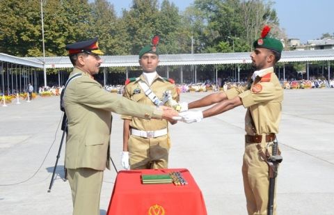 Gen Rashad awarding the coveted Sword of Honour to Battalion Senior Under Officer Muhammad Waleed of 133rd PMA Long Course.