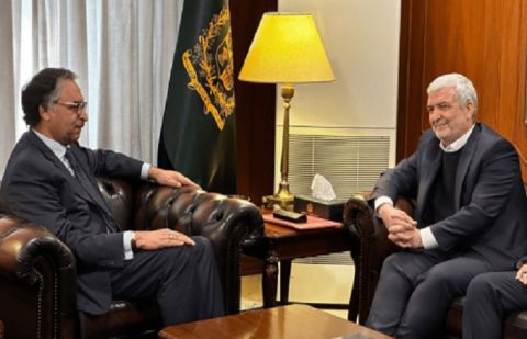 Caretaker Foreign Minister Jalil Abbas Jilani talking to Iran’s Special Representative for Afghanistan Affairs Hassan Kazmi Qomi