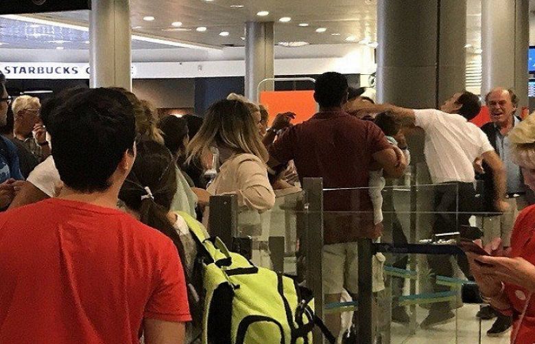 French airport staffer punches Easyjet passenger holding baby