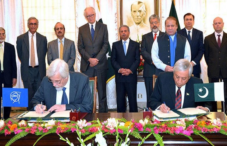 Prime Minister Nawaz Sharif witnesses the signing of an agreement with CERN at the PM House in Islamabad on Friday.