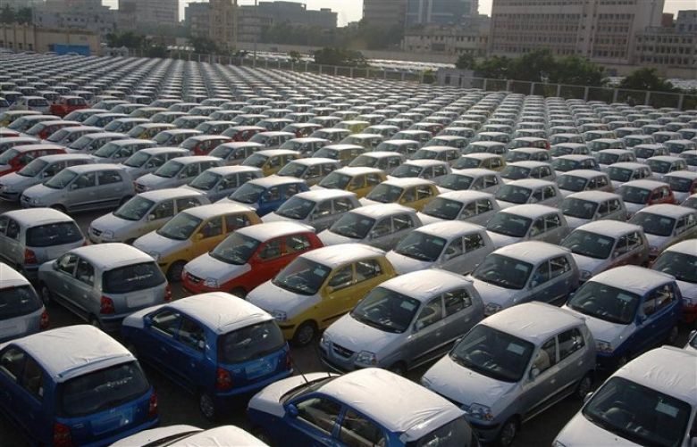 Cars are seen ready for shipment at a port