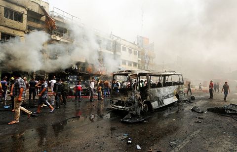 More than 22 died in two bombings in Baghdad