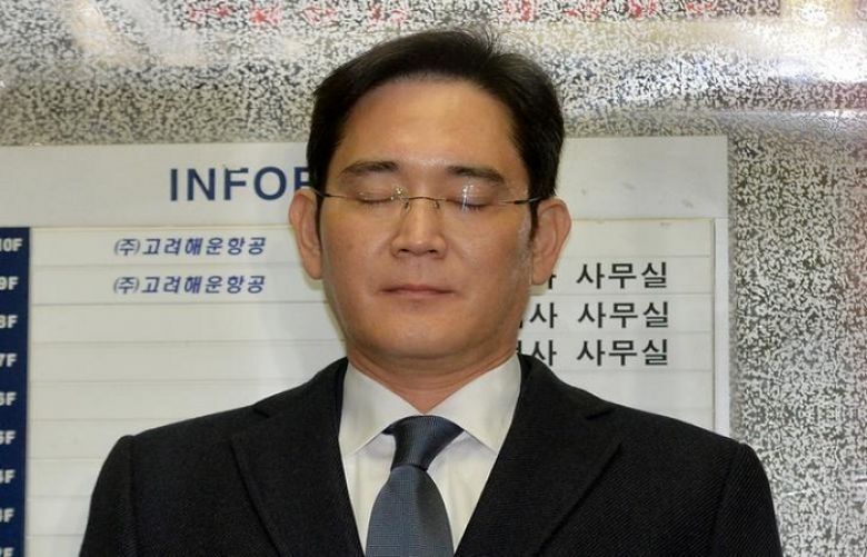 Samsung Group chief, Jay Y. Lee, rides on an elevator as he arrives at the office of the independent counsel in Seoul, South Korea, February 16, 2017.