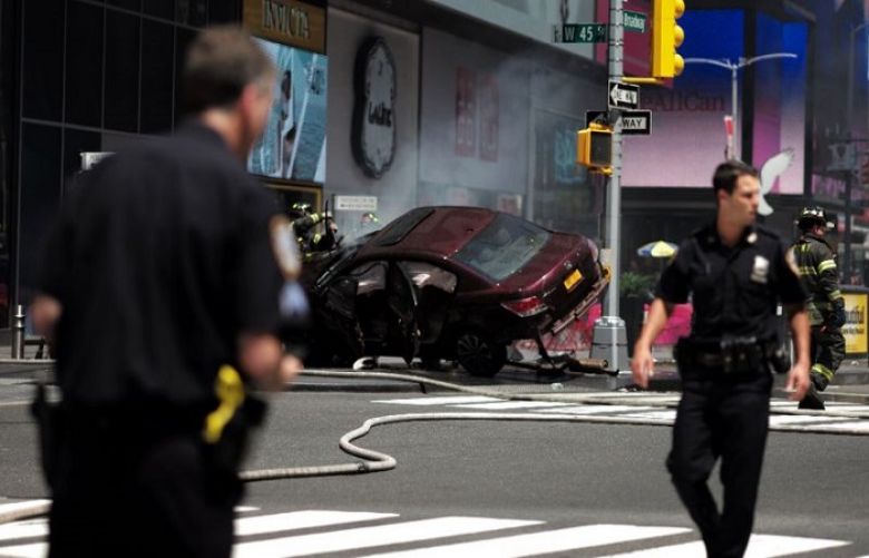 One dead as car hits crowd in Times Square, police say accident