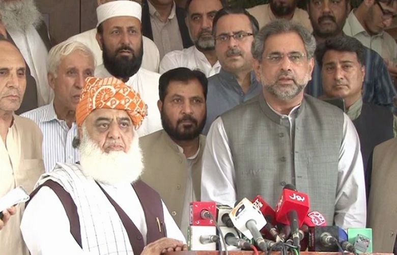 Shahid Khaqan Abbasi and Jamiat Ulema-i-Islam-Fazl (JUI-F) chief Maulana Fazlur Rehman
