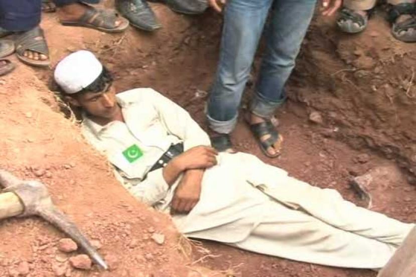 PAT, PTI protestors dig up graves around D-Chowk in Islamabad