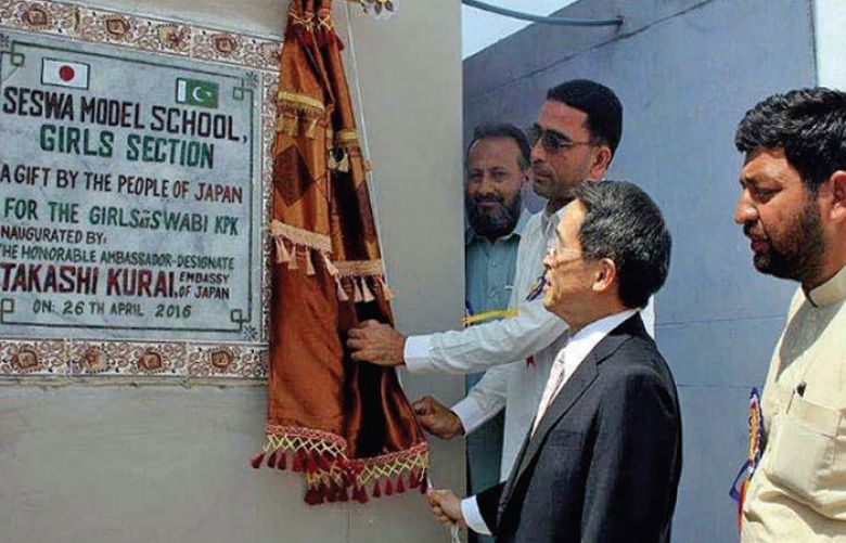 Japanese envoy Takashi Kurai inaugurates a girls school at village Shewa, Swabi, on Tuesday. 