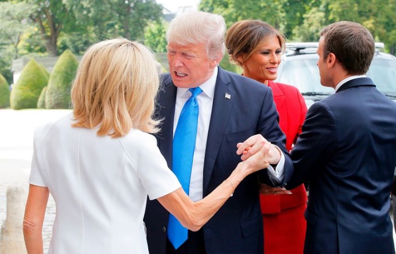 President Trump handshake with France&#039;s first lady