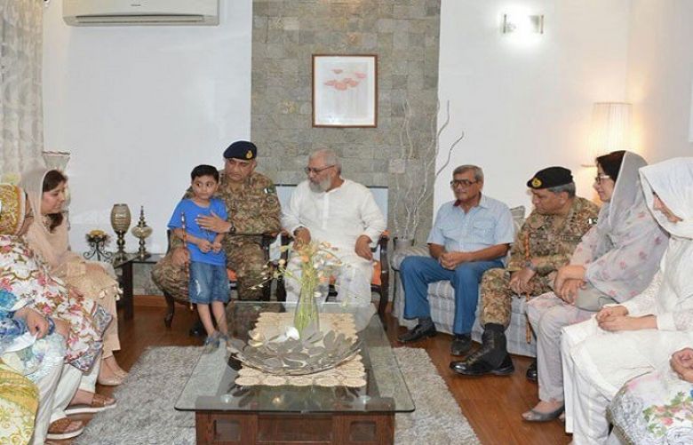 General Bajwa visits family of major martyred in Dir