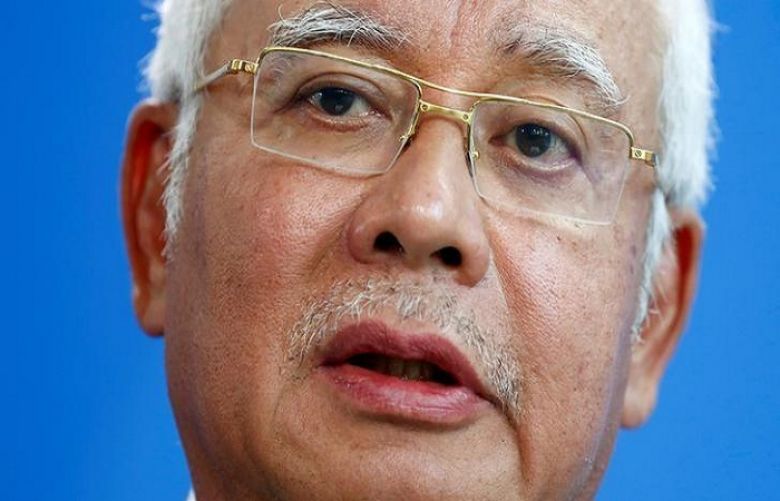 Malaysian Prime Minister Najib Razak addresses a news conference
