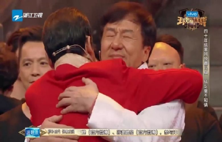 Jackie Chan moved to tears by surprise reunion with his old stunt team