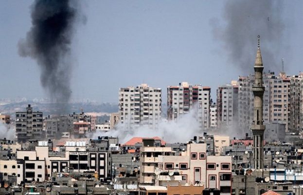 Israel strikes dozens of targets in Gaza Strip, Palestinians respond