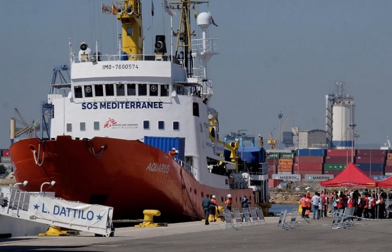 First group of refugees arrive in Spain after days at sea