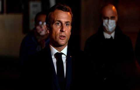 Virus to stay 'at least until next summer: Emmanuel Macron